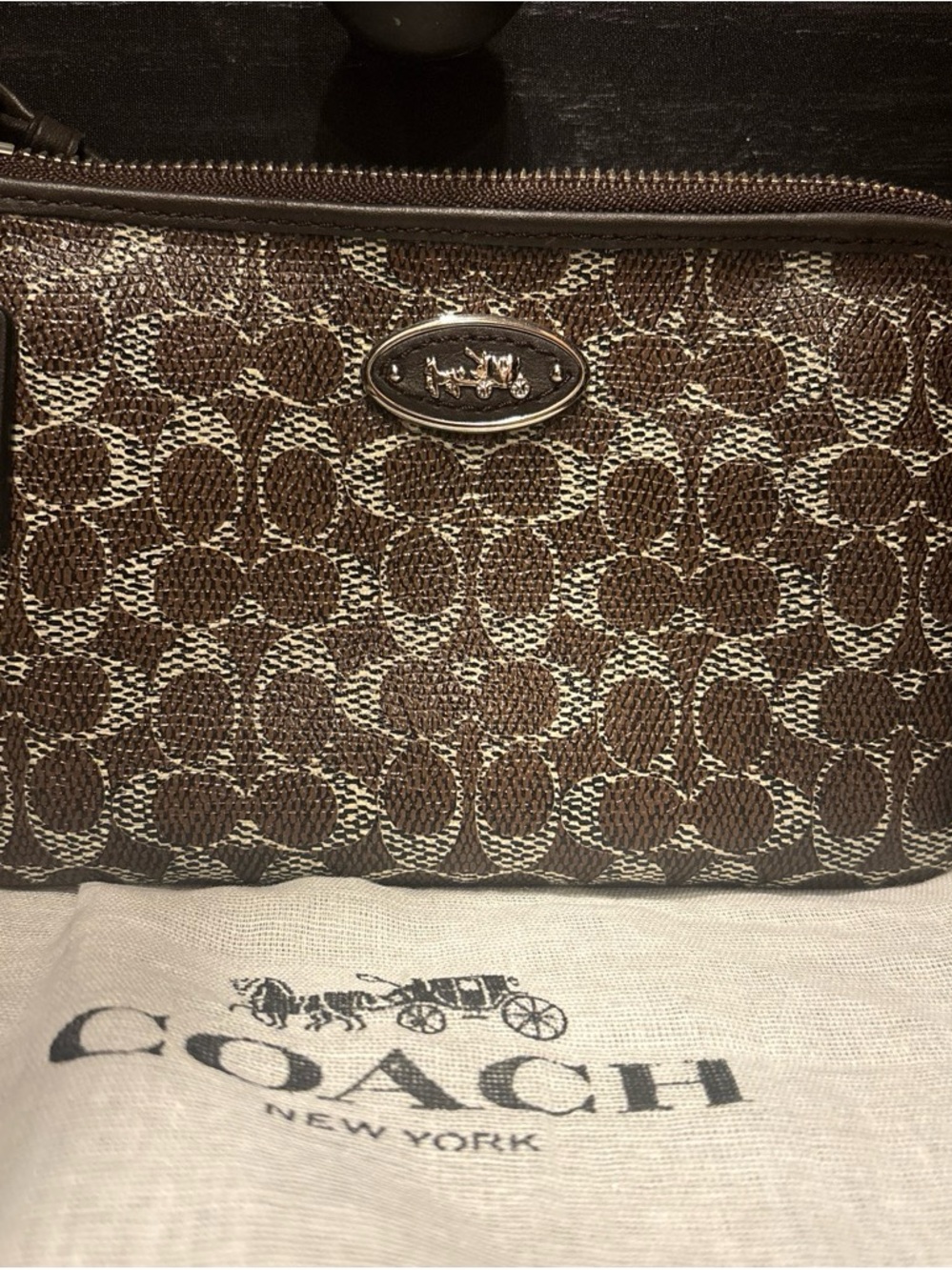 Coach Brown Signature Canvas Wristlet with Silver Logo Plaque